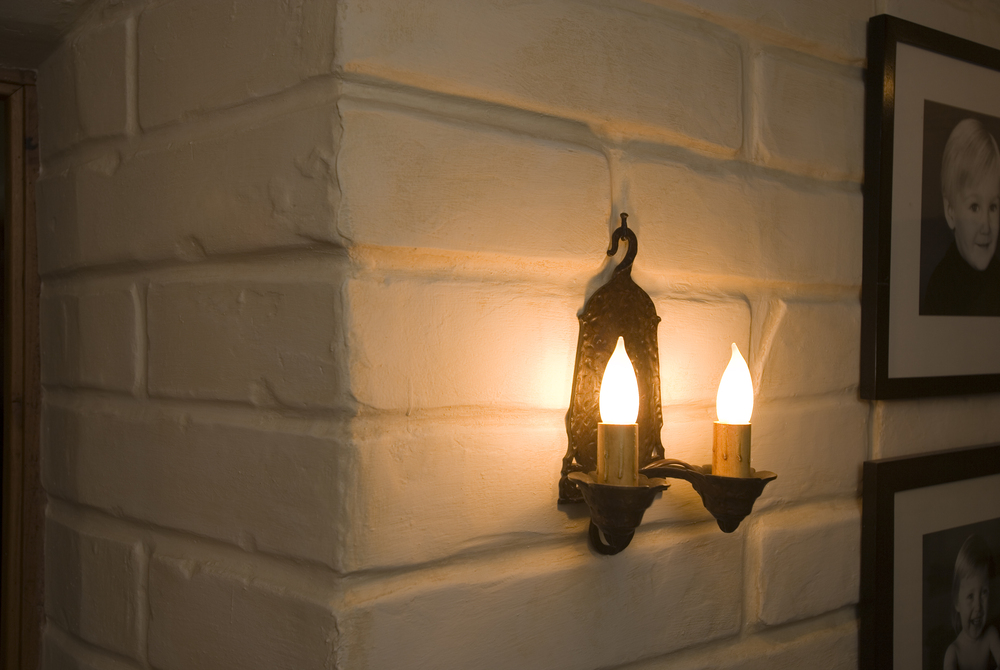 Faux adobe with sconce